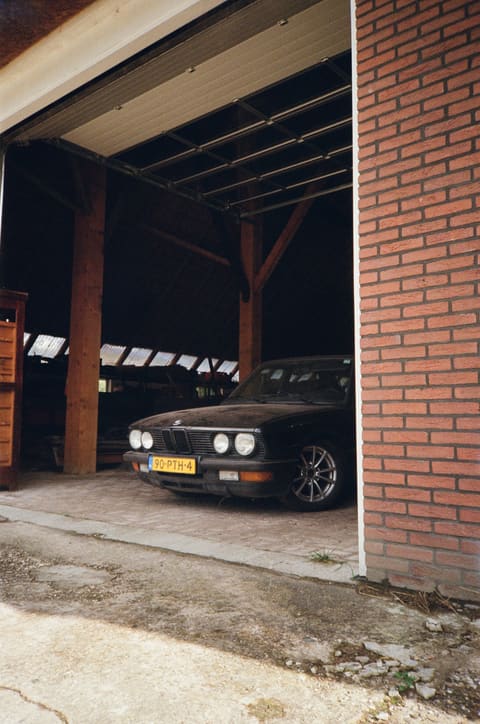 Automotive photograph near modern architecture
