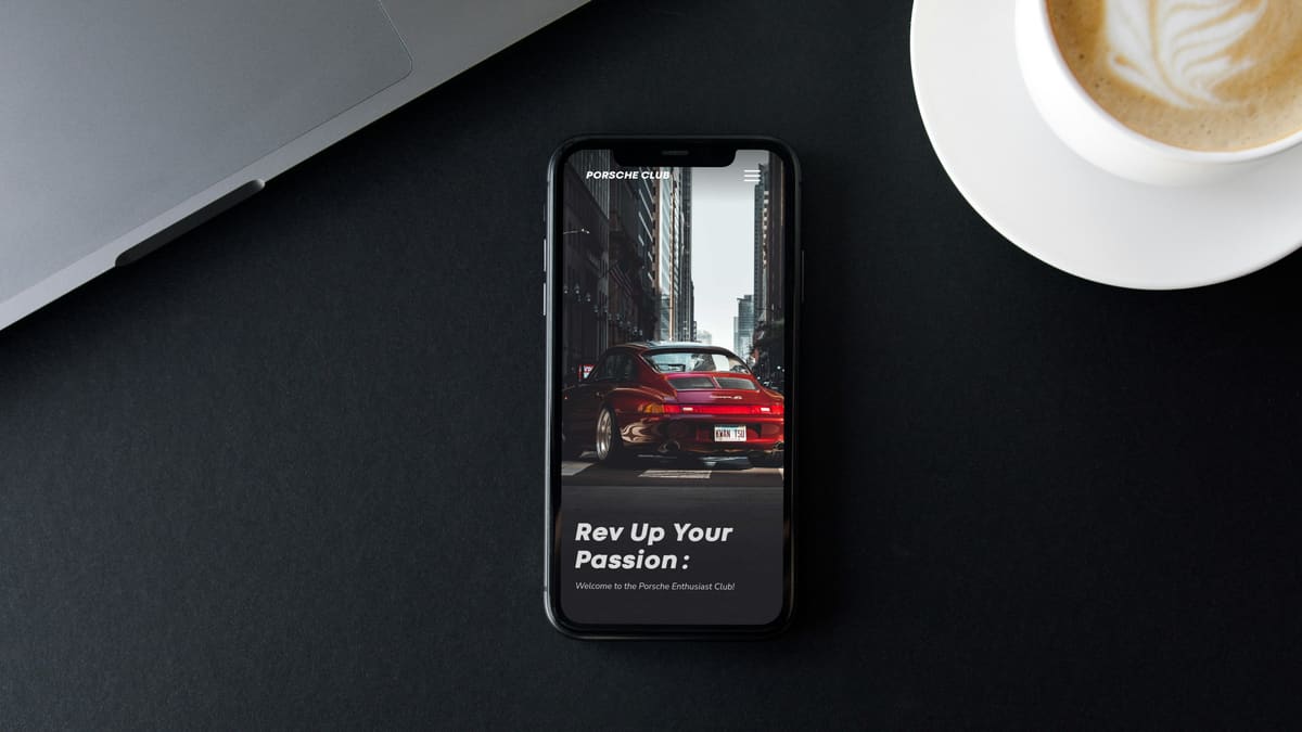 Porsche Club website mockup on a laptop